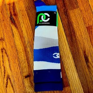 New Pro Compression socks. Never used. Made in the USA.